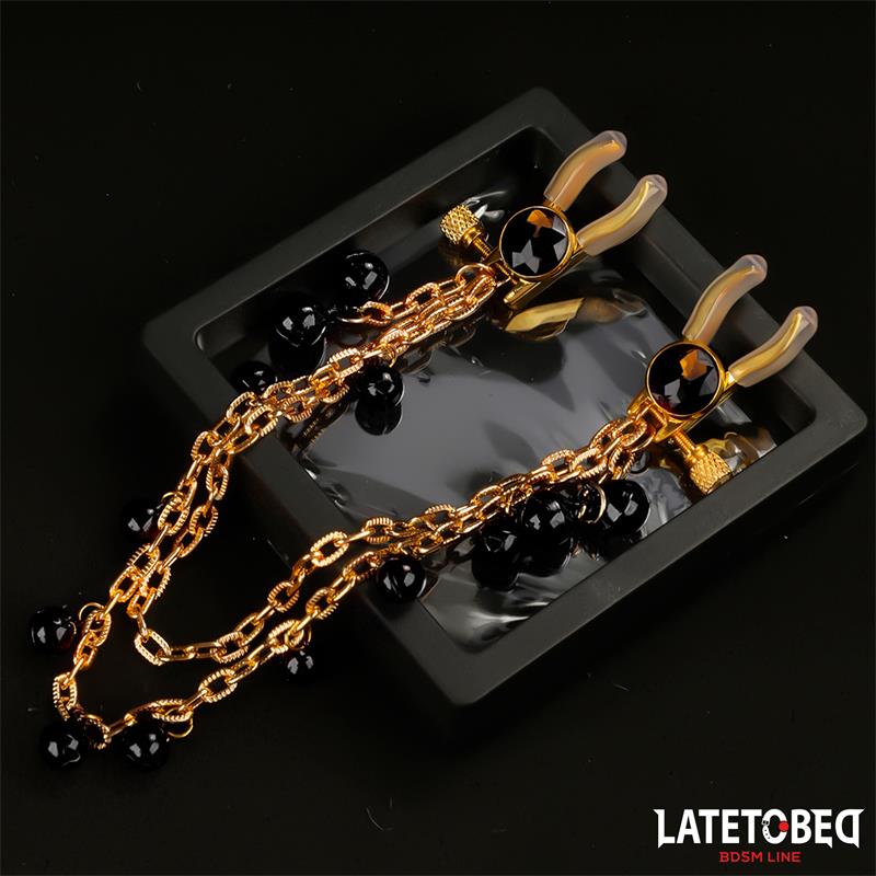 nipple-clamps-with-chain-and-bells-2 BDSM LINE Nipple Clamps with Chain and Bells - LATETOBED - Image 3